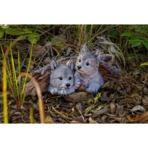 Gray Wolves Cubs Under Log